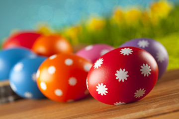 Colored Easter eggs on blue background