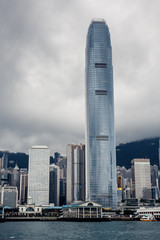 Naklejka premium Yacht Hong Kong city buildings