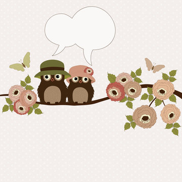 Cute owls on a branch with speech bubble