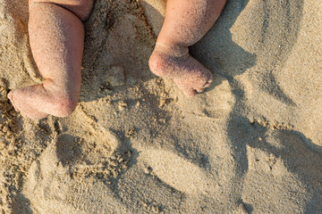 Baby feet on the beach