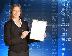 Business woman standing holding a clip board and ballpoint pen