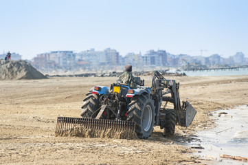 Tractor with rake