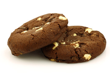 chocolate chip cookies with nuts on a white background