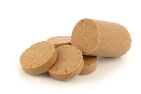 pieces of traditional Dutch  liver sausage on a white background