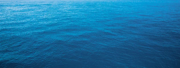Tuinposter Oceaan golf blauwe water zee voor achtergrond