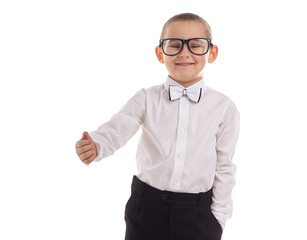 Young boy laughing with his thumb up