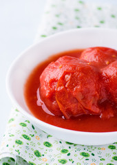 Canned tomatoes in bowl