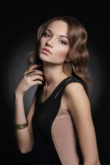 Fototapeta na wymiar Beautiful young woman in jewelery
