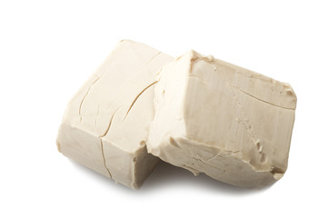 Yeast cubes close up on the white