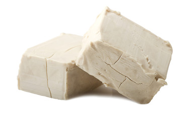 Yeast cubes close up on the white