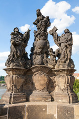 Fototapeta na wymiar Statues at Carl's Bridge in Prague, Czech Republic