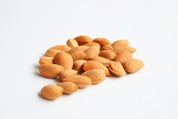 Almonds on white background.