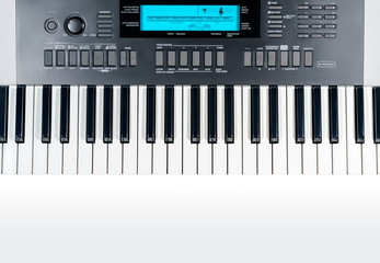 View from above of a synthesizer isolated on a gradient light