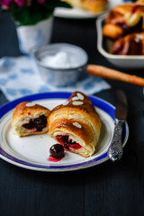 Croissant with cherries