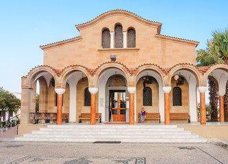 Fototapeta na wymiar Church of St. Nektarios with a bell tower. Faliraki. Rhodes Isl
