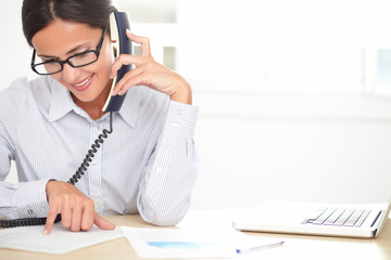 Female company worker talking on the phone