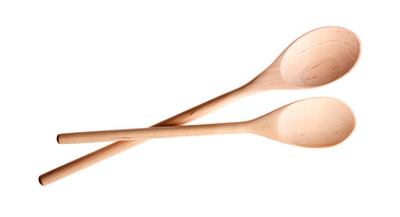 New wooden spoons isolated on white background.