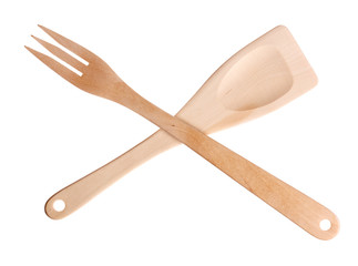 Wooden spatula and fork on white background.
