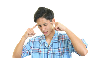 頭痛を訴える男性