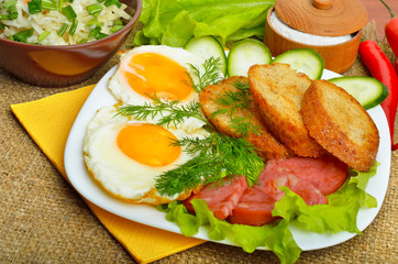 English breakfast - toast, egg, bacon and vegetables