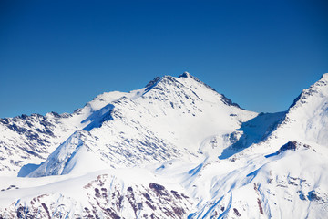 Fototapeta na wymiar Beautiful peak view Caucasus mountains in winter