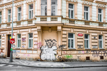 Historical building with walls painted in graffiti