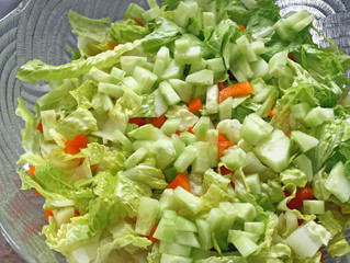 Fresh Garden Salad with orange bell pepper and cubed cucumber