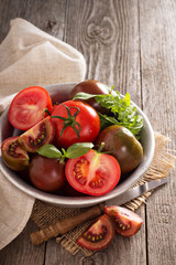 Ripe fresh tomatoes in a bowl