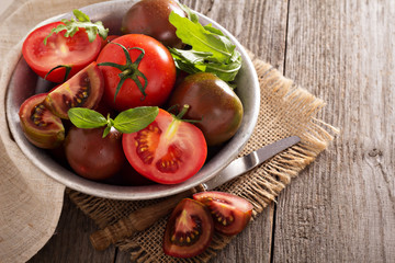 Ripe fresh tomatoes in a bowl