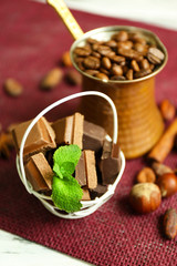 Still life with set of chocolate, spices and nuts