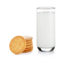 glass of milk and cracker isolated on white background