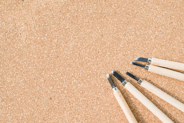 Set of chisels for wood on cork board background