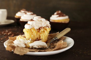 Delicious cupcakes on table close-up