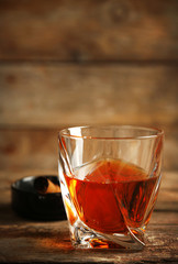 Whiskey on wooden background