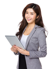 Fototapeta premium Woman holding tablet computer