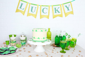Composition for St Patrick Day with sweets and drinks