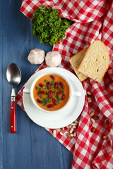 Bean soup in bowl with fresh sliced bread