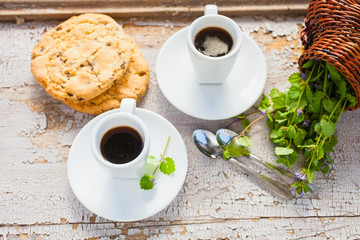 coffee, cookies and cultivated flowers
