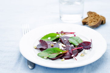 salad with roasted beets, goat cheese, mangold and pistachios