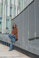 Beautiful girl posing in an urban context