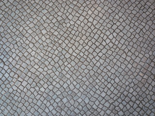 Small irregular squared floor tiles