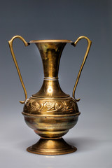 Fototapeta na wymiar hammered brass vase India