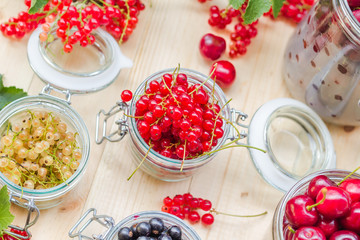 red white black currants gooseberries cherries jars preparations