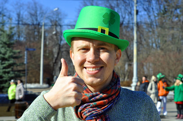 Smiling guy during St Patrick's day party 