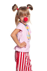 Little girl with clown nose