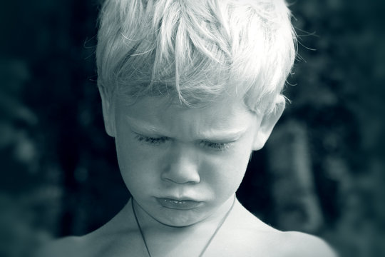 serious young boy monochrome portrait
