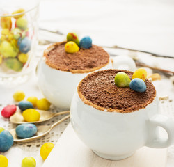 Easter cream dessert tiramisu based in portioned cups