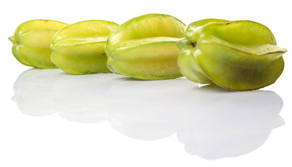 Starfruit or carambola over white background