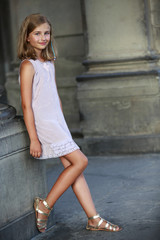 Beautiful young girl in summer dress in Venice, Italy