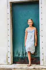 Beautiful young girl in summer dress in Venice, Italy